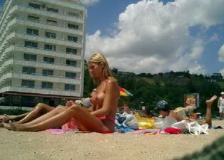 Naked female at naturist beach..