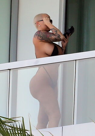 Amber Rose flashes off her lush