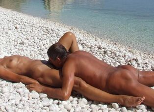 Wow! Nudists plumbing on the beach!